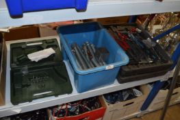 *Three Toolboxes and a Box Containing Threaded Bar
