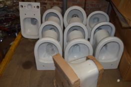 *Eleven White WCs