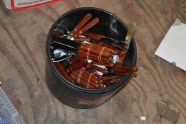 *Box of Steak Knives and Corkscrews