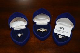 Three White Metal Dress Rings set with Stones