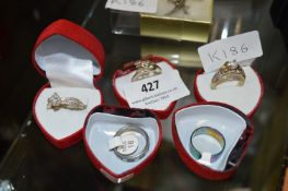 Three Dress Rings set with Stones and Two Stainless Steel Bands