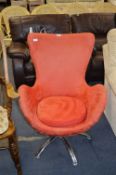 Orange Upholstered Swivel Egg Chair