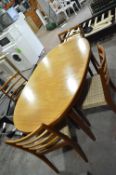 Teak Extending Dining Table and Four Chairs
