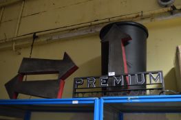 *Three Illuminated Arrows and a Sign