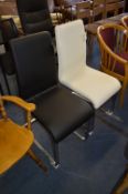 *Two Leatherette Dining Chairs on Chrome Bases (One White One Black)