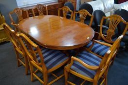 Yew Wood Twin Pedestal Extending Dining Table with Six Blue Stripe Upholstered Dining Chairs and Two