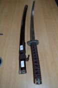 Ornamental Samurai Sword with a Red Speckled Sheath and Dragon Handle Decoration