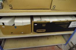 Two Boxes Containing Paper Towel Dispensers