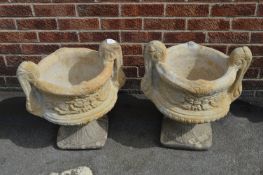 Pair of Constitute Limestone Garden Urns on Plinths