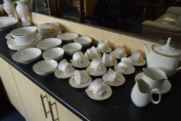 Large White Gilt Decorated Tea and Dinner Service
