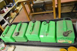Seed Trays and Five Petrol Cans