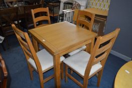 Light Drawer Leaf Dining Table and Four Barback Chairs