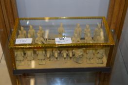 Small Glass Cased Figurines 
