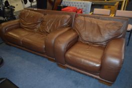 Brown Leatherette Suite; Two Seat Sofa and an Armchair