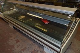Trimco Refrigerated Deli Style Counter with Curved Glass Front and Stainless Steel Back