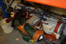 Three Golf Bags with Large Quantity of Golf Clubs, Balls and Two Trolleys