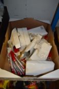 Box Containing Red Permanent Markers