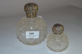 Pair of Embossed Silver Topped Perfume Bottles
