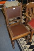 Oak Hall Chair with Carved Lion Heads and Leather Seat