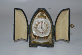 Cased Miniature Mother of Pearl and Brass Travel Clock