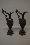 Pair of Cast Metal Jugs with Cherub Design