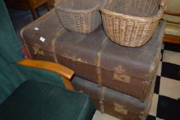 Two Brown Rexine Covered Traveling Trunks
