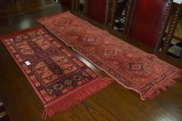 Two Small Red Pattern Runner Rugs