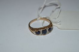 9cT Gold set with Sapphire and Diamonds