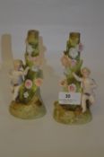 Pair of Pottery Spill Vases with Cherubs