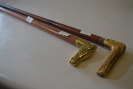 Two Walking Canes; One Horn and One Brass Handled