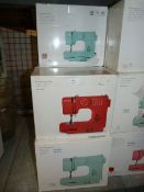 *Fourteen John Lewis Mini Sewing Machines (Various Colours)
