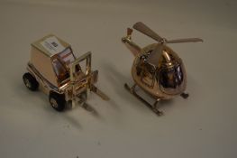 Two Money Boxes in the Form of Forklift Truck and Helicopter
