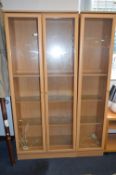 Beech Effect Glazed Two Door Display Cabinet and a Matching Single Door Cabinet