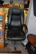 Black Leather Effect Swivel Office Armchair