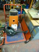 Clarke Strongarm Platform Barrow, Paraffin Heater, Wheelbarrow and a Mechanics Trolley