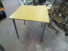 Office Table with Simulated Light Oak Top on Grey Legs