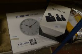 Kitchen Clock and a Box Containing Katana Cordless Telephones