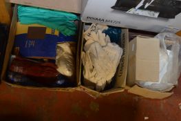 Two Boxes of Safety Gloves and a Paper Towel Dispencer