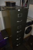 Green Metal Four Drawer Filing Cabinet
