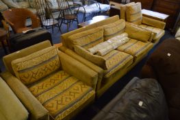 Brown and Leaf Patterned Suite; Two Seat Sofa and Two Armchairs