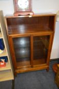 Mahogany Cased Bookshelf with Glass Sliding Doors