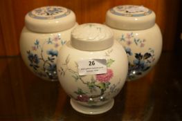 Three Floral Decorated Ginger Jars with Lids