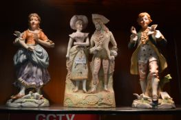 Three Painted Bisque Pottery Figurines