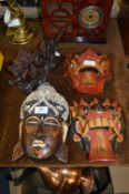 Three Carved Wood Wall Masks and a Dragon