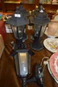 Set of Four Outdoor Post Lights and a Wall Mounted Light