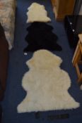 Three Sheepskin Rugs, Two White One Black