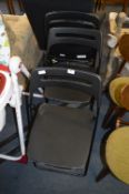 *Set of Three Black Plastic Folding Chairs