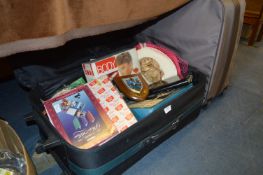 Two Wheeled Suitcase and Contents; Body Massager, Wine Goblets, Hats, Chrome Tray, Wall Shields,