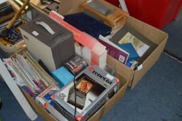 Two Boxes Containing Slide Projector, Maps, Games Compendium, Table Lamp, Books, etc.