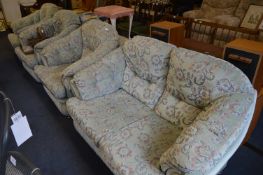 Light Green Floral Upholstered Four Piece Suite; Two Seat Sofa and Three Armchairs